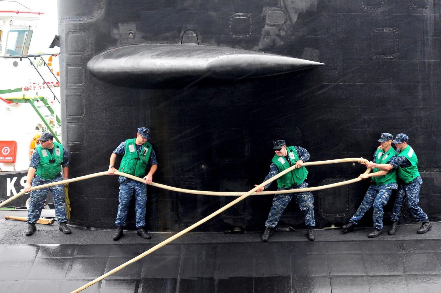 Sailors secure the Los Angeles class attack submarine USS Dallas in Diego Garcia (Hum Images/Universal Images Group via Getty Images)